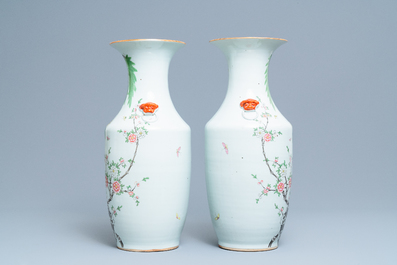 A pair of Chinese famille rose vases with birds among blossoming branches, 19/20th C.