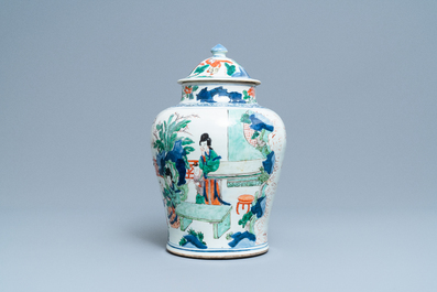 A Chinese wucai 'playing boys' vase and cover, Transitional period