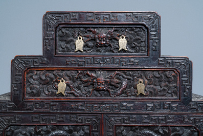 Un petit cabinet en bois sculpt&eacute; &agrave; d&eacute;cor de dragons, Chine, R&eacute;publique