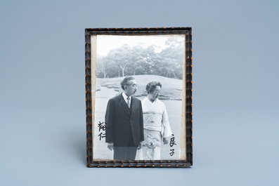 A signed black and white photograph of the Japanese emperor Hirohito and empress Nagako, 1970's