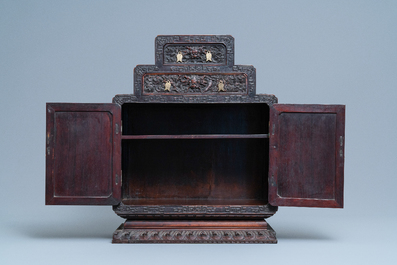 A small Chinese carved wooden 'dragon' cabinet, Republic