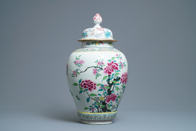 A large Chinese famille rose vase and cover with a bird on blossoming branches, Yongzheng