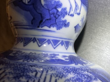 A Chinese blue and white double gourd vase, Transitional period