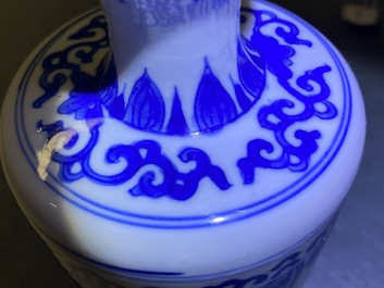 A pair of Chinese blue and white vases and covers, Kangxi