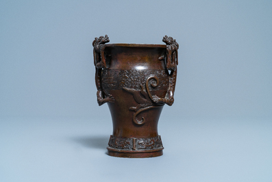 A Chinese dragon-handled bronze vase, Ming