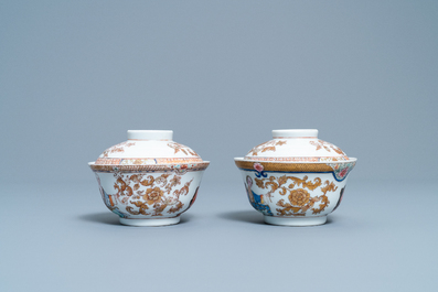 A pair of Chinese famille rose bowls and covers with a European couple, Yongzheng