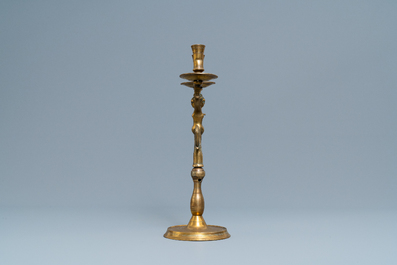 A large bronze candlestick with a siren with dolphin tails, Nuremberg, Germany, 16th C.