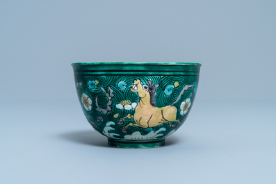 A Chinese verte biscuit bowl with horses, Kangxi