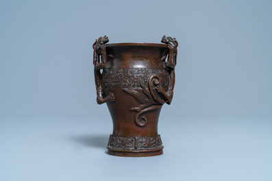 A Chinese dragon-handled bronze vase, Ming