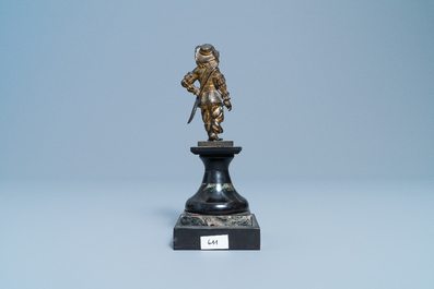 A Dutch gilt bronze model of a soldier, 17th C.