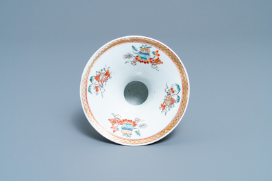 A Chinese relief-decorated 'squirrel and grapevine' spittoon, Yongzheng