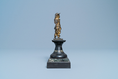 A Dutch gilt bronze model of a soldier, 17th C.
