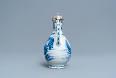 A Chinese blue and white silver-mounted ewer, Transitional period