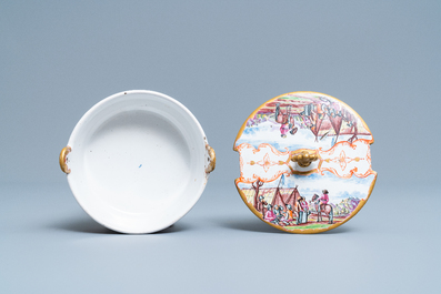 A polychrome petit feu and gilded Dutch Delft butter tub with a view on an encampment, 18th C.