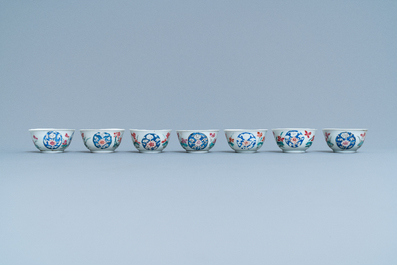 Seven Chinese famille rose cups and five saucers, Qianlong