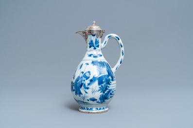 A Chinese blue and white silver-mounted ewer, Transitional period