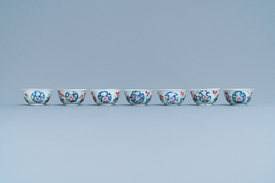 Seven Chinese famille rose cups and five saucers, Qianlong