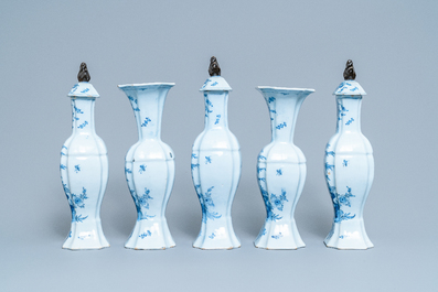 A Dutch Delft blue and white five-piece garniture with floral chinoiserie design, 18th C.