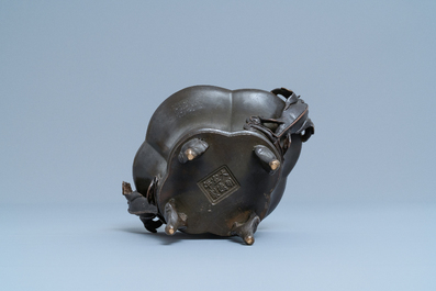 A Chinese chilong-handled bronze censer, Xuande mark, 18th C.