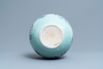 Een Chinese jardini&egrave;re met blauw-wit decor op celadon fondkleur, Qianlong