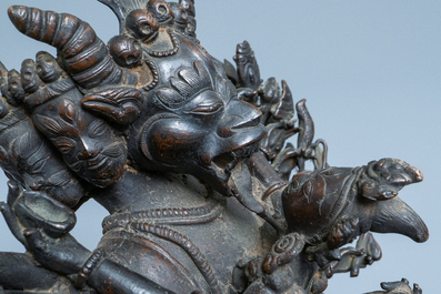 A Tibetan bronze group of Mahakala and his consort Yab-Yum, 19th C.