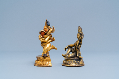 Two Sino-Tibetan gilt bronze figures, 19th C.