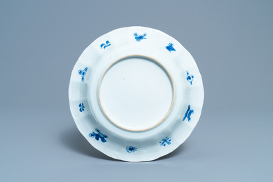 A Chinese blue and white lobed dish with fish, Kangxi