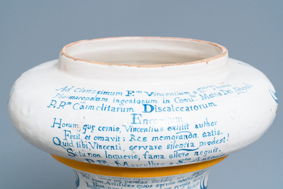 An important pair of large inscribed Italian maiolica drug jars and covers, Naples, dated 1724