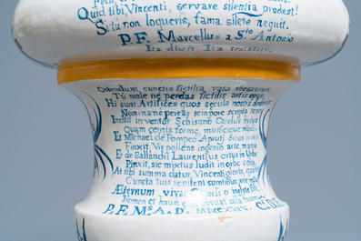 An important pair of large inscribed Italian maiolica drug jars and covers, Naples, dated 1724