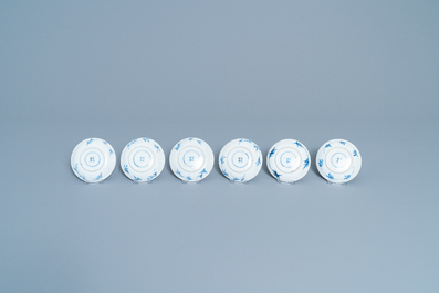 Six Chinese blue and white cups and saucers with horseriders, Kangxi