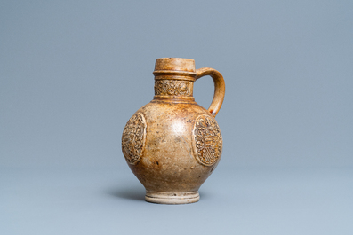 A stoneware jug with three armorial medallions, Raeren, ca. 1600