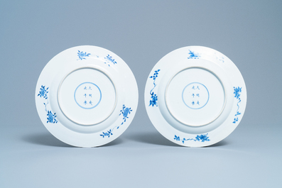 A pair of Chinese blue and white dishes with ladies on a terrace, Chenghua mark, Kangxi