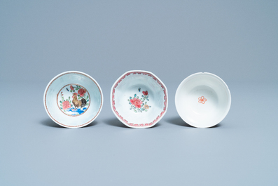 Three Chinese famille rose cups and saucers, Yongzheng/Qianlong