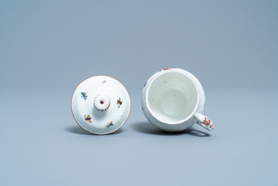 A polychrome Tournai porcelain plate and a cream bowl and cover with birds, 18th C.