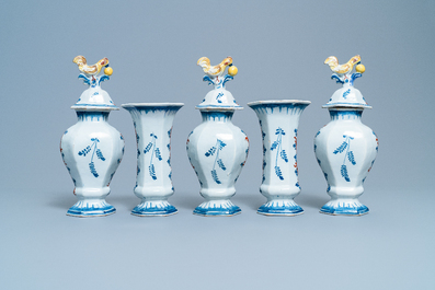 A polychrome Dutch Delft five-piece garniture with chicken-shaped finials, 18th C.