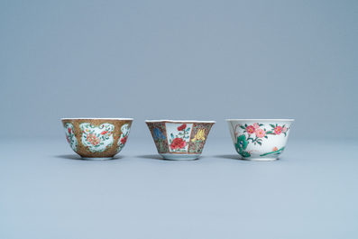 Three Chinese famille rose cups and saucers, Yongzheng/Qianlong