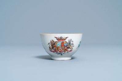 Une tasse et soucoupe en porcelaine de Chine famille rose pour le march&eacute; hollandais aux armes de Van Scholten et Wesele, Qianlong