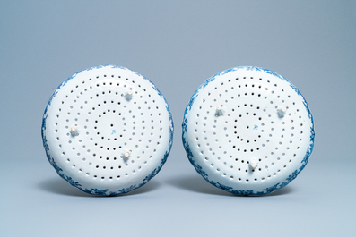 A pair of Dutch Delft blue and white strawberry strainers on stands, 18th C.