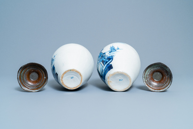 A pair of Dutch Delft blue and white tobacco jars with indians, 18th C.