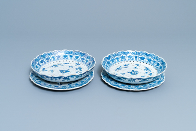 A pair of Dutch Delft blue and white strawberry strainers on stands, 18th C.