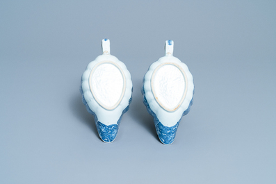 A pair of Chinese blue and white 'Romance of the Western Chamber' sauce boats on stand, Qianlong