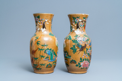 A pair of Chinese Nanking crackle-glazed vases with moulded design of Li Tieguai, 19th C.