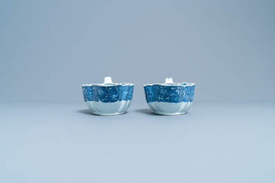 A pair of Chinese blue and white 'Romance of the Western Chamber' sauce boats on stand, Qianlong