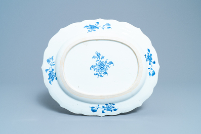 A large oval Chinese blue and white 'Romance of the Western Chamber' dish, Qianlong