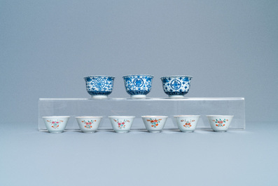 A varied collection of Chinese famille rose and blue and white cups and saucers, Qianlong and 19th C.