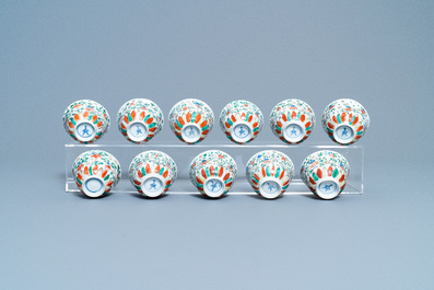 Eleven Chinese famille verte cups and thirteen saucers, Kangxi