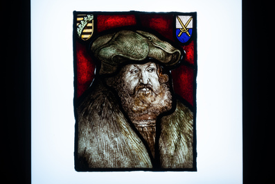 Two stained glass fragments, Flanders or France, one dated 1532