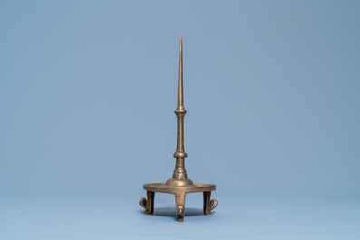 A Flemish or Dutch bronze candlestick, 14/15th C.