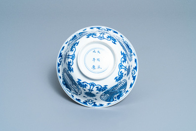 A Chinese blue and white 'dragon and phoenix bowl', Chenghua mark, Kangxi