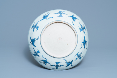 A large Chinese blue and white dish with a landscape with pagoda, Jiajing